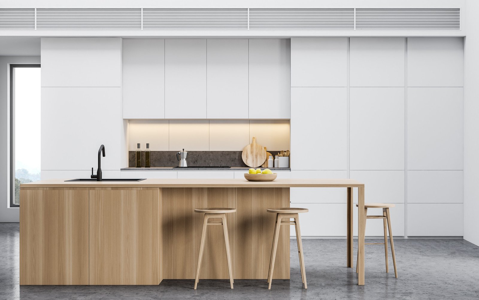 Modern kitchen design by Axiom Renovation in the Bay Area featuring sleek white cabinetry, a minimalist island, and ample natural light.