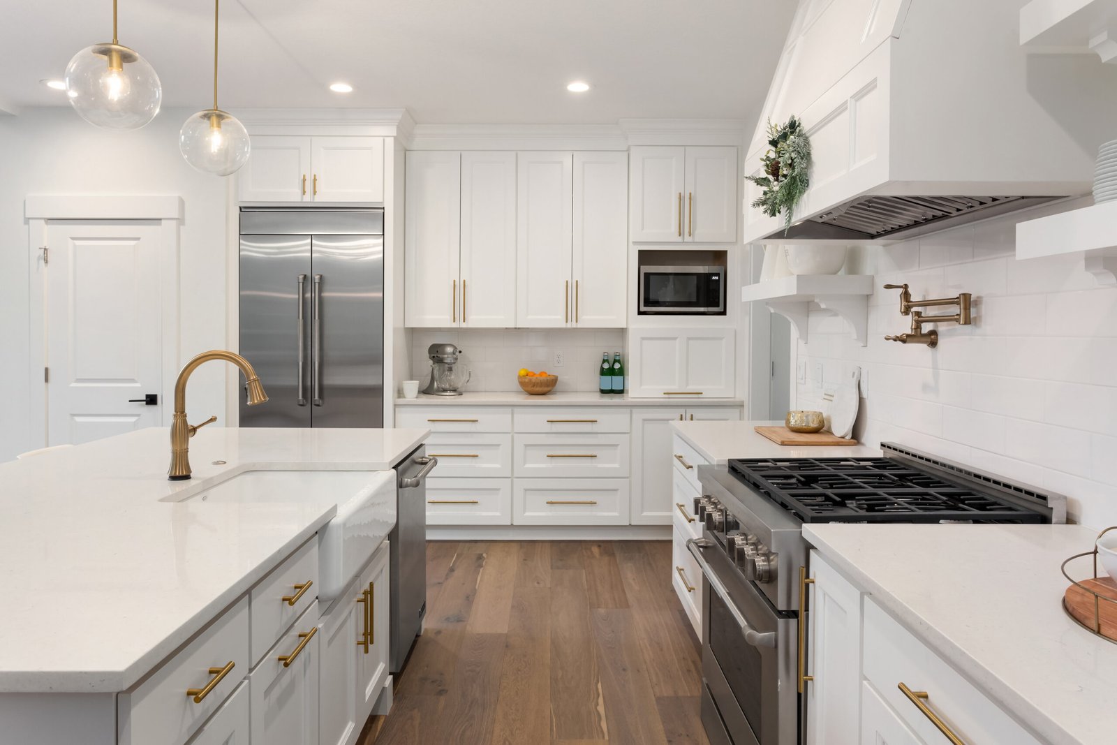 Traditional kitchen upgrade by Axiom Renovation featuring gold accents and a classic layout in the Bay Area.