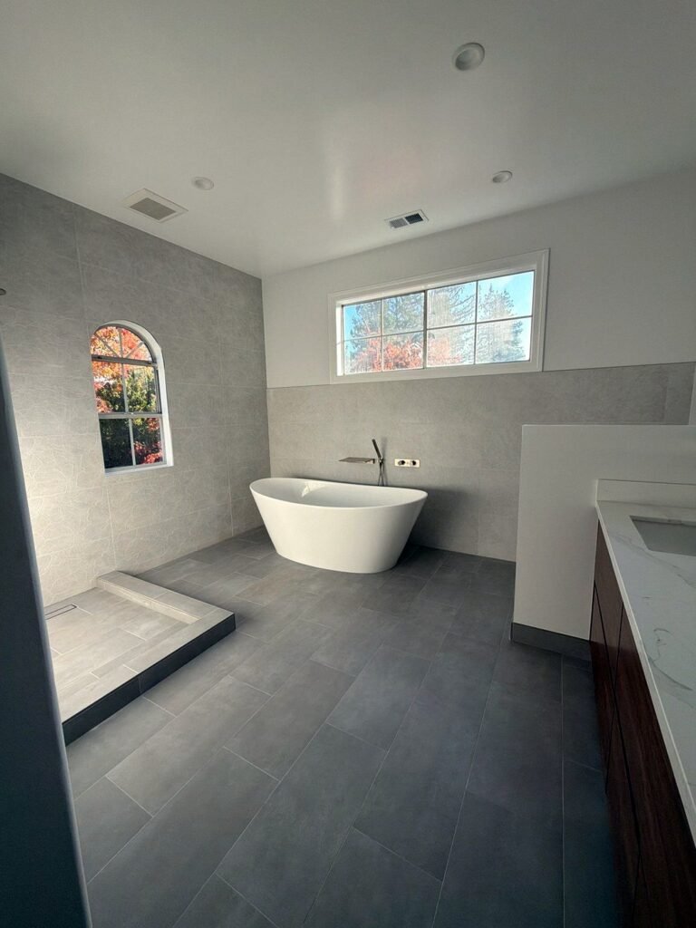 Primary bathroom with open walk-in shower and freestanding tub, Los Gatos