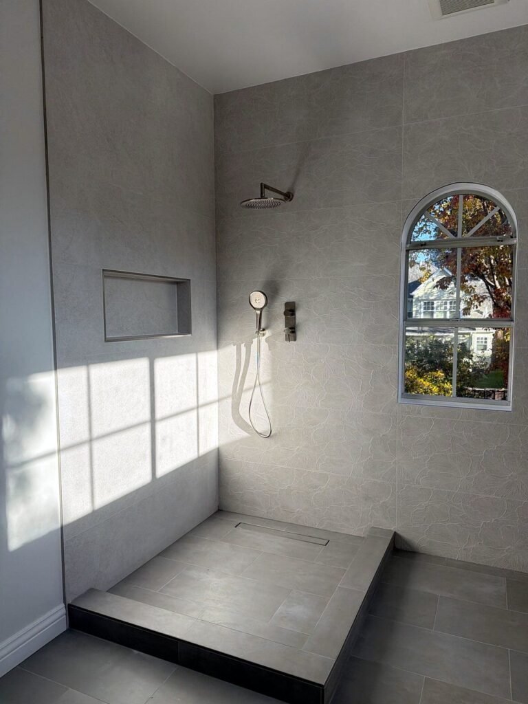 Large walk-in shower with linear drain and handheld shower, Los Gatos