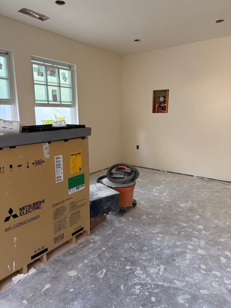 Heat pump equipment staged for installation in a Los Altos ADU