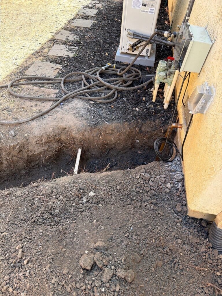 Trench for the underground electrical service feeding a Los Altos ADU