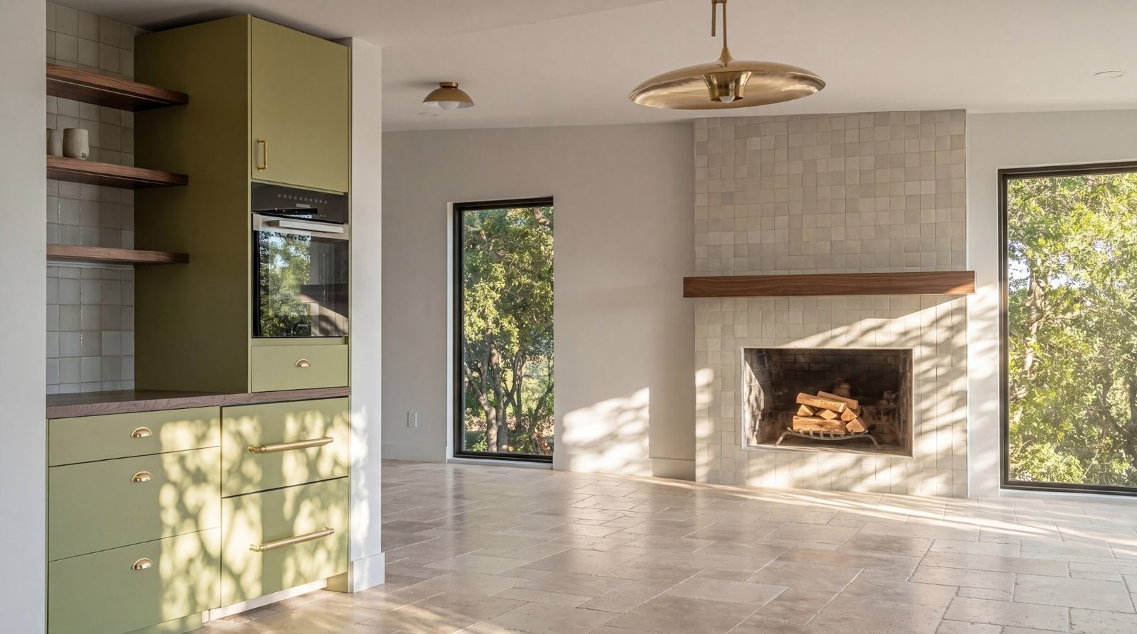 Great room with fireplace and olive kitchen