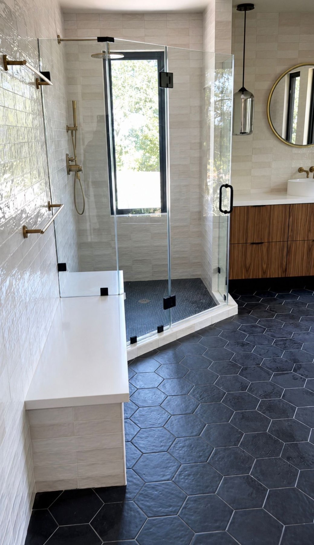 Primary bath with black hexagon tile