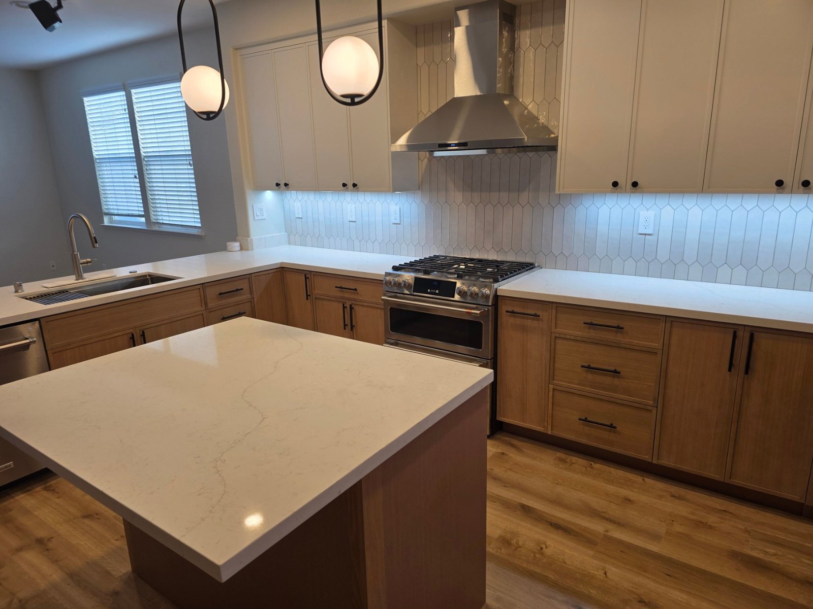 Kitchen island with globe pendants in Richmond
