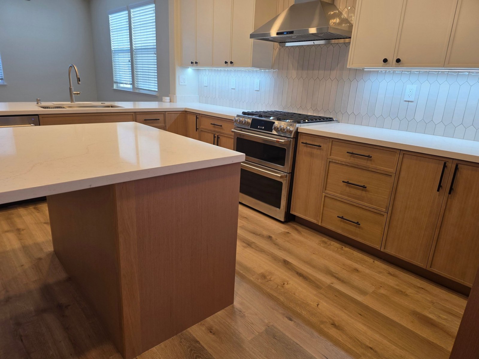 Oak cabinets and double ovens in Richmond